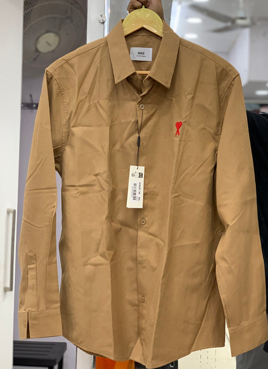 AM I BEIGE SHIRT WITH RED LOGO